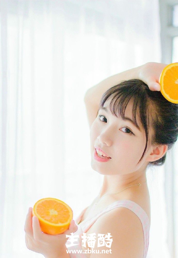 甜橙女孩俏皮丸子头粉色连衣裙皮肤水嫩少女感十足图片