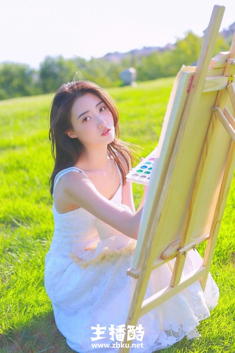 长发飘飘小清新美女漂亮瓜子脸一袭白裙户外作画图片